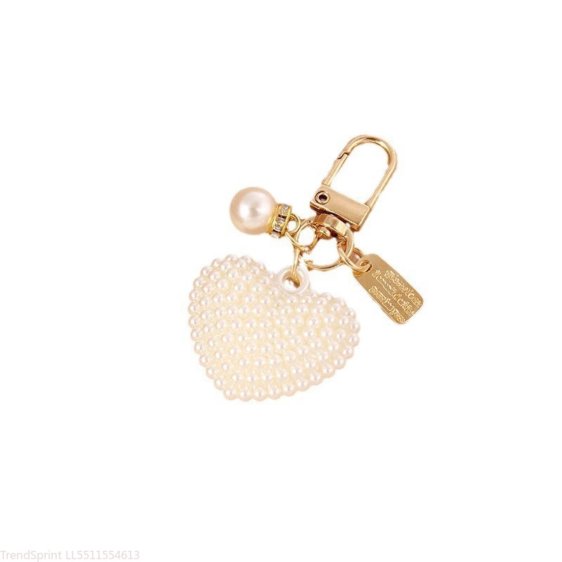 Elegante parelsleutelhangerhan - Women'S Key Accessories recensie en prijs